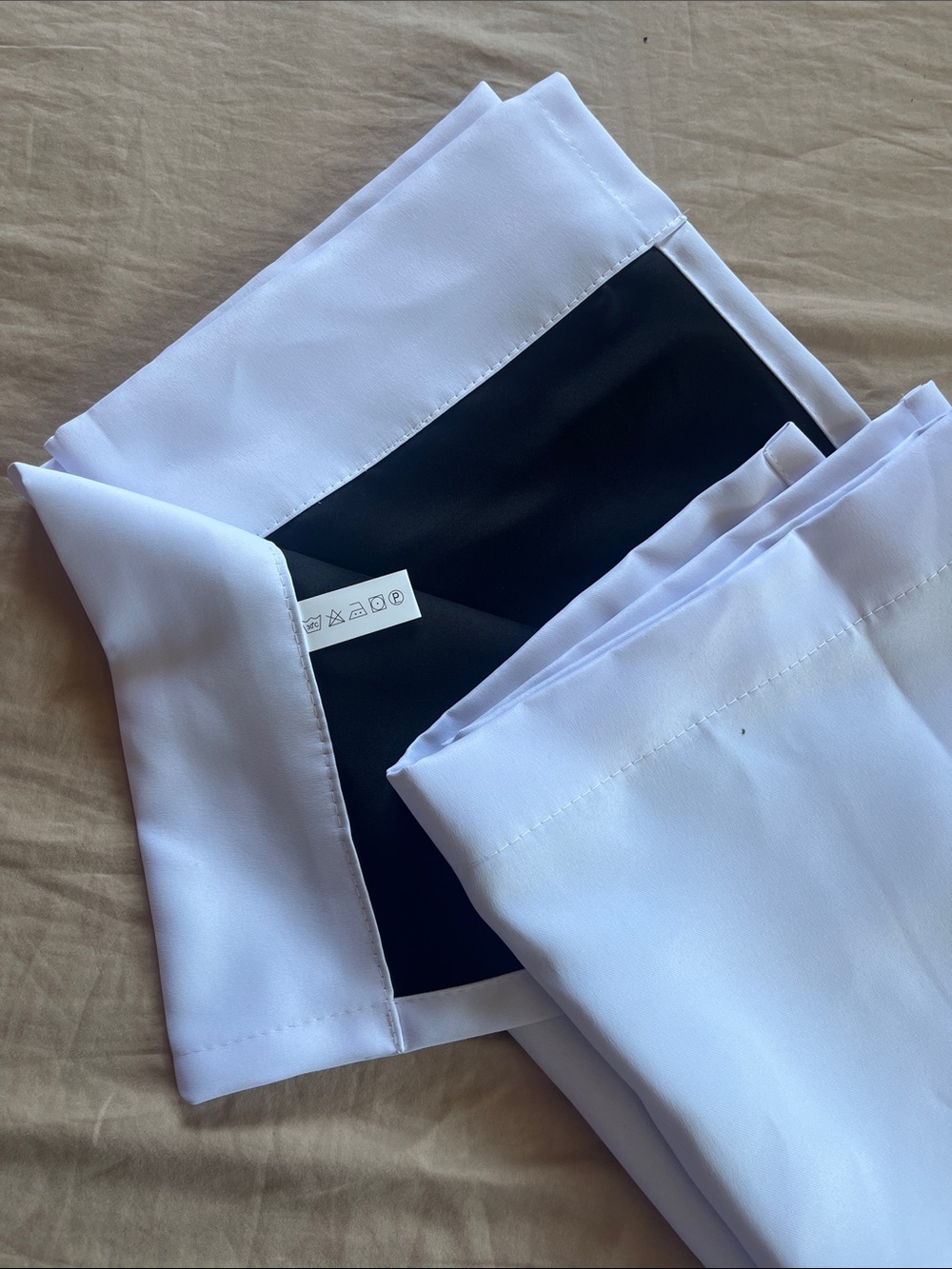 Single blackout curtain drapery: White with black lining